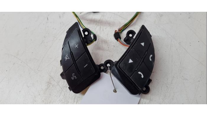Steering wheel mounted radio control from a Fiat Doblo Cargo (263) 1.3 D Multijet 2016