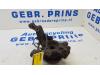 Knuckle, front left from a Renault Clio III (BR/CR) 1.6 16V 2007