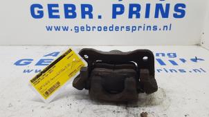 Used Front brake calliper, left Nissan Pixo (D31S) 1.0 12V Price € 30,00 Margin scheme offered by Autorec. Gebr. Prins b.v.