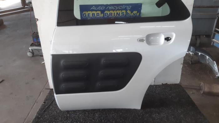 Rear door 4-door, left from a Citroën C4 Cactus (0B/0P) 1.2 PureTech 82 12V 2017
