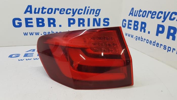 Taillight, left from a BMW 5 serie Touring (F11) 530d xDrive 24V Blue Performance 2013