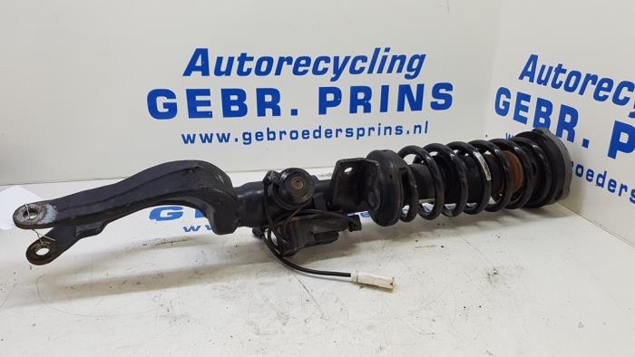 Front shock absorber rod, left from a BMW 5 serie Touring (F11) 530d xDrive 24V Blue Performance 2013