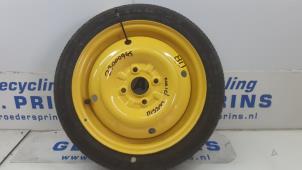 Used Space-saver spare wheel Nissan Pixo (D31S) 1.0 12V Price € 44,00 Margin scheme offered by Autorec. Gebr. Prins b.v.