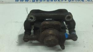 Used Front brake calliper, left Mini Mini (R56) 1.4 16V One Price € 30,00 Margin scheme offered by Autorec. Gebr. Prins b.v.