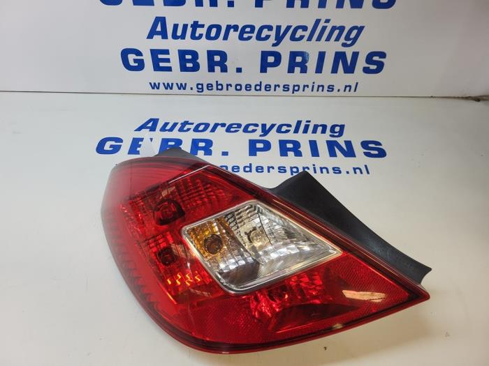 Taillight, left from a Opel Corsa D 1.4 16V Twinport 2013