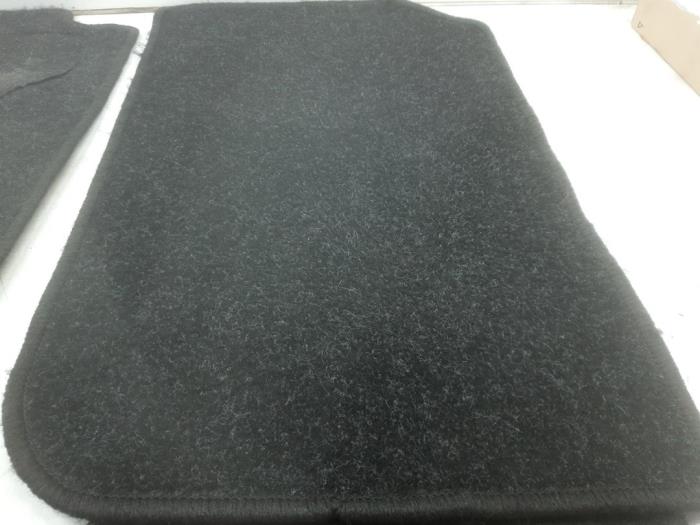 Set of mats from a Peugeot 206+ (2L/M) 1.4 XS 2009