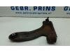 Front lower wishbone, left from a Opel Combo (Corsa C) 1.6 16V CNG 2008