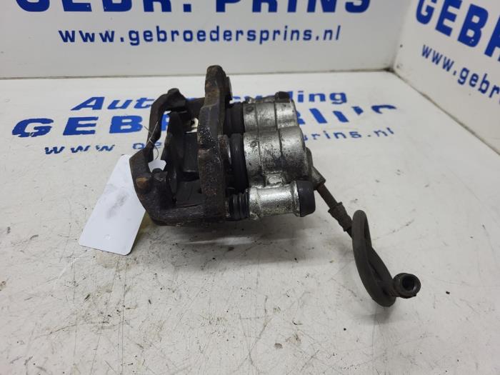 Front brake calliper, left from a Mercedes-Benz Sprinter 3,5t (906.63) 313 CDI 16V 4x4 2016