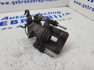 Used Rear brake calliper, left Volkswagen Caddy III (2KA,2KH,2CA,2CH) 1.6 TDI 16V Price € 38,50 Margin scheme offered by Autorec. Gebr. Prins b.v.