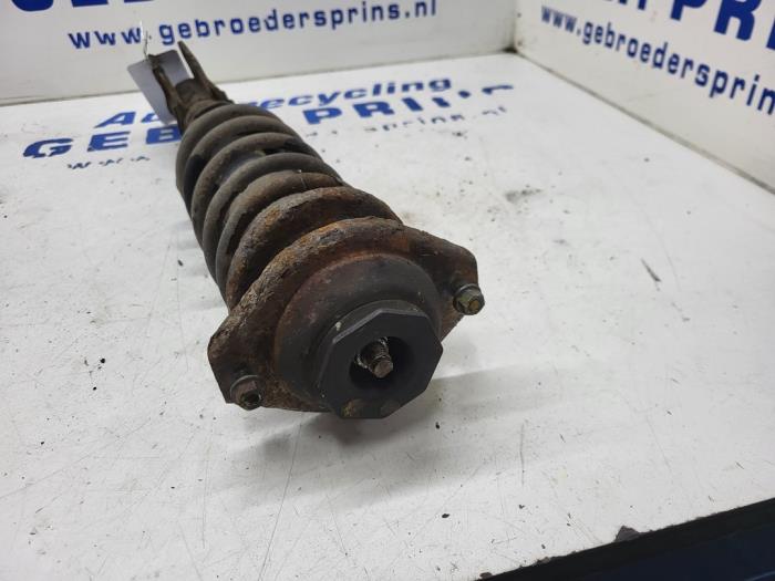 Front shock absorber rod, left from a Suzuki Alto (RF410) 1.1 16V 2005