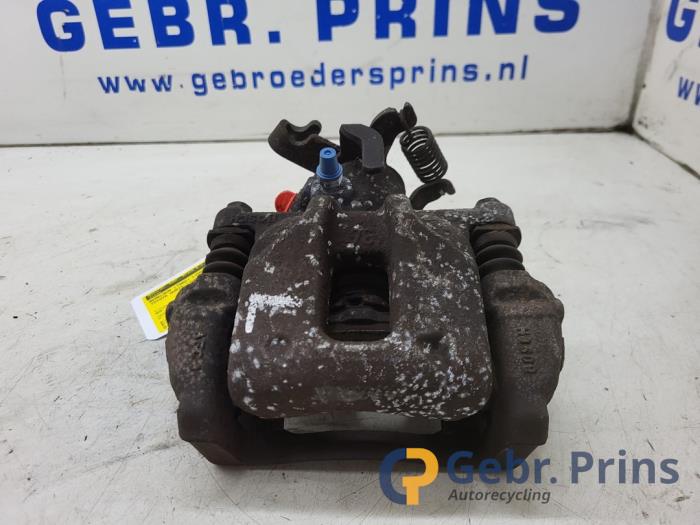 Brake caliper carrier