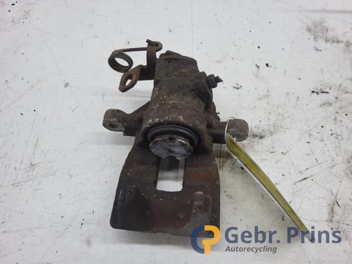 Gebrauchte Bremszange links hinten Peugeot 207/207+ (WA/WC/WM) 1.6 16V Preis € 35,00 Margenregelung angeboten von Autorec. Gebr. Prins b.v.