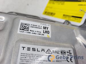 On-board computer controller from a Tesla Model Y (5YJY) RWD 2023