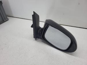 Usagé Rétroviseur extérieur droit Daihatsu Cuore (L251/271/276) 1.0 12V DVVT Prix € 30,00 Règlement à la marge proposé par Autorec. Gebr. Prins b.v.