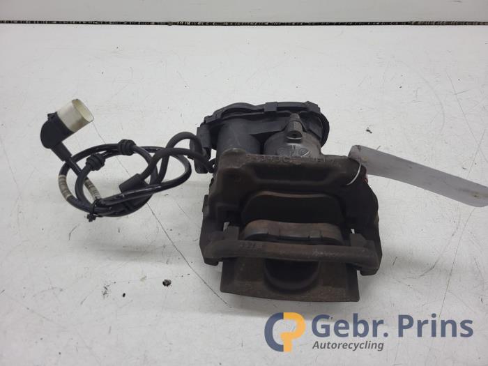 Brake caliper carrier