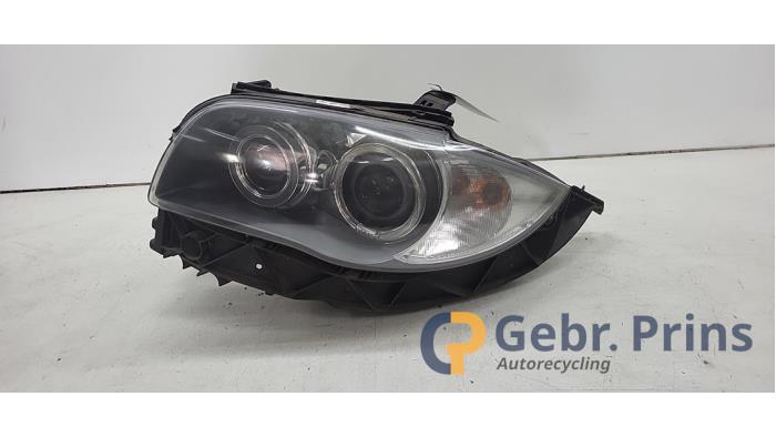 Używane Reflektor lewy BMW 1 serie (E87/87N) 116i 2.0 16V Cena € 200,00 Procedura marży oferowane przez Autorec. Gebr. Prins b.v.