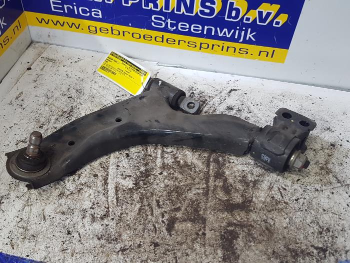 Front lower wishbone, left from a Daewoo Spark 1.0 16V Bifuel 2012