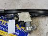 Door window motor from a BMW 5 serie Touring (E61) 525i 24V 2005