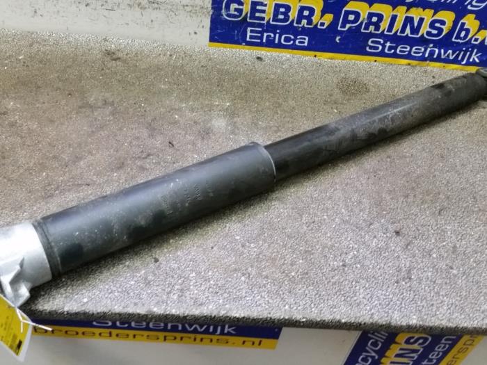 Rear shock absorber, left from a Volvo V40 (MV) 2.0 T2 16V 2015