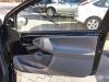 Tapizado de puerta de 2 puertas derecha de un Toyota Aygo (B10) 1.4 HDI 2008
