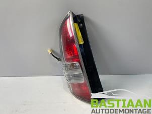 Used Taillight, left Daihatsu Sirion 2 (M3) 1.0 12V DVVT Price € 29,99 Margin scheme offered by Bastiaan Autodemontage