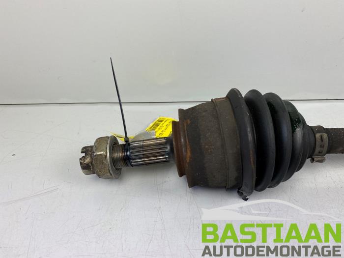 Front drive shaft, left from a Opel Corsa D 1.4 16V Twinport 2009