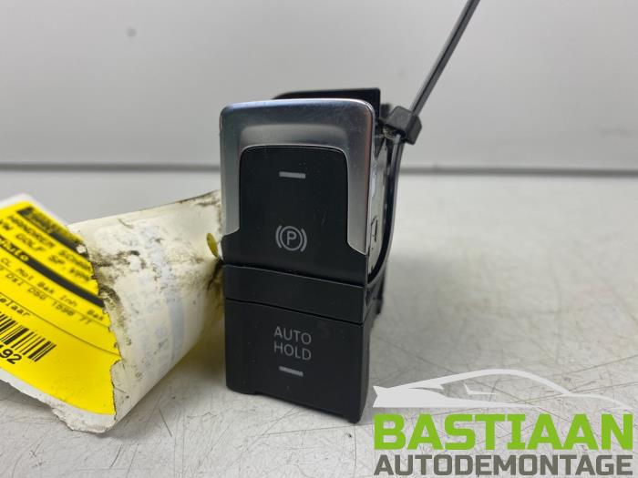 Interruptor de freno de mano de un Volkswagen Golf Sportsvan (AUVS) 1.6 TDI BMT 16V 2019