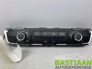 Used Air conditioning control panel BMW 1 serie (F20) 116i 1.5 12V Price on request offered by Bastiaan Autodemontage