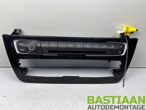 Used Radio control panel BMW 1 serie (F20) 116i 1.5 12V Price € 99,99 Margin scheme offered by Bastiaan Autodemontage