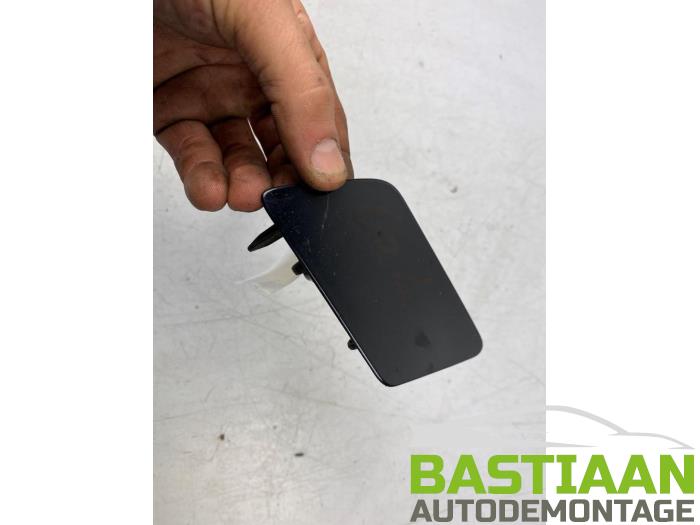 Cover cap headlight washer left from a Volkswagen Polo V (6R) 1.2 TDI 12V BlueMotion 2011