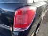 Tailgate trim from a Opel Astra H SW (L35) 1.6 16V Twinport 2006