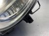 Headlight, left from a Volkswagen Polo IV (9N1/2/3) 1.4 16V 75 2006