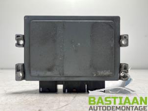 Engine management computer from a Ford Fiesta 6 (JA8) 1.4 16V 2011