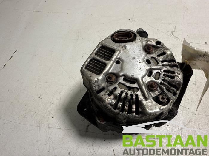 Dynamo van een Daihatsu Cuore (L251/271/276) 1.0 12V DVVT 2009
