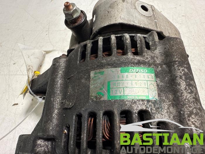 Dynamo van een Daihatsu Cuore (L251/271/276) 1.0 12V DVVT 2009