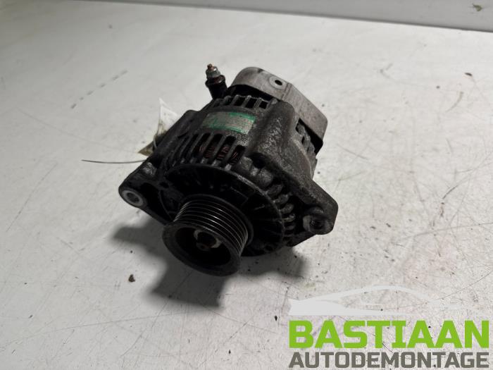 Dynamo van een Daihatsu Cuore (L251/271/276) 1.0 12V DVVT 2009