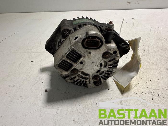Dynamo van een Daihatsu Cuore (L251/271/276) 1.0 12V DVVT 2009