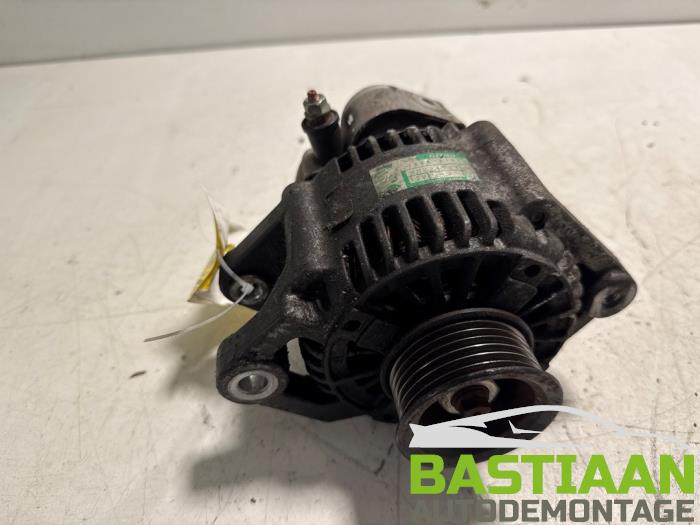 Dynamo van een Daihatsu Cuore (L251/271/276) 1.0 12V DVVT 2009