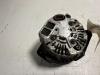 Dynamo van een Daihatsu Cuore (L251/271/276) 1.0 12V DVVT 2009