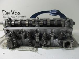 Używane Glowica cylindra Peugeot 405 Cena € 160,00 Procedura marży oferowane przez De Vos Autodemontagebedrijf
