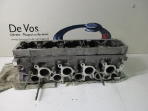 Used Cylinder head Peugeot 307 Price € 250,00 Margin scheme offered by De Vos Autodemontagebedrijf