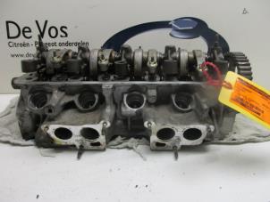 Used Cylinder head Peugeot 106 II 1.1 XN,XR,XT,Accent Price € 160,00 Margin scheme offered by De Vos Autodemontagebedrijf