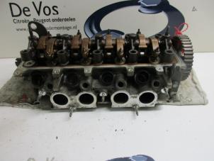 Used Cylinder head Peugeot 306 Break (7E) 1.6i XR,XT,ST Price € 160,00 Margin scheme offered by De Vos Autodemontagebedrijf