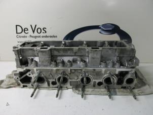 Używane Glowica cylindra Peugeot 206 (2A/C/H/J/S) 1.4 HDi Cena € 250,00 Procedura marży oferowane przez De Vos Autodemontagebedrijf