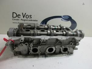 Used Cylinder head Peugeot 407 Price € 450,00 Margin scheme offered by De Vos Autodemontagebedrijf