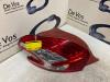 Taillight, left from a Peugeot 208 I (CA/CC/CK/CL) 1.4 16V 2013