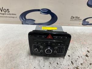 Used Radio CD player Peugeot RCZ (4J) 1.6 16V THP Price € 750,00 Margin scheme offered by De Vos Autodemontagebedrijf