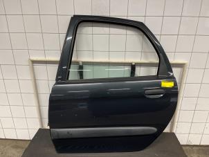 Używane Drzwi lewe tylne wersja 4-drzwiowa Citroen Xsara Picasso (CH) 1.8 16V Cena € 135,00 Procedura marży oferowane przez De Vos Autodemontagebedrijf