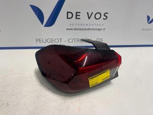 Usagé Feu arrière secondaire gauche Opel Corsa F (UB/UH/UP) 1.2 12V 75 Prix € 115,00 Règlement à la marge proposé par De Vos Autodemontagebedrijf