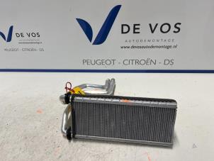 Usados Radiador de calefactor Peugeot Partner (EF/EU) 1.5 BlueHDi 130 Precio € 200,00 Norma de margen ofrecido por De Vos Autodemontagebedrijf